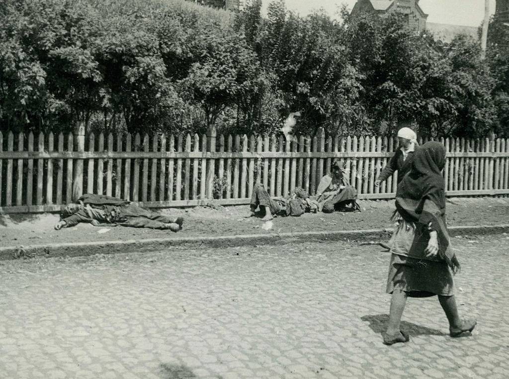 Starved peasants on a street in Kharkiv, 1933.